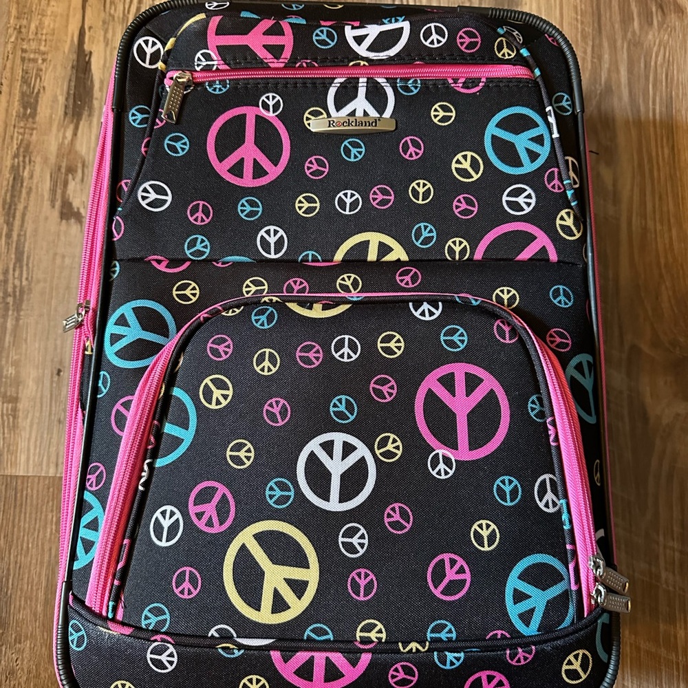 Rockland Rolling Suitcase Peace Sign Pink/Black